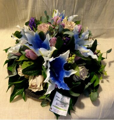 Flower arrangement on tray. White & Blue Flowers !!!