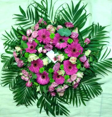 Funeral wreath on "oasis moss base"