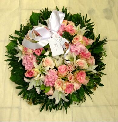 Funeral wreath on "oasis moss base"