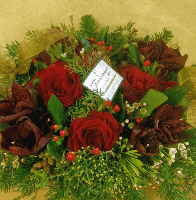 Christmas red flowers in  basket