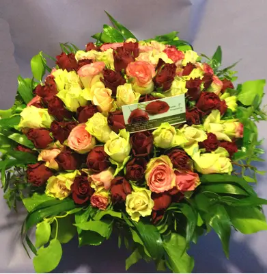 Pink & Red Roses (100) stems round basket arrangement. Exclusive Varieties !