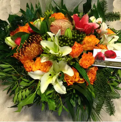 Christmas Arrangement Tropical Flowers & Candle & Decoration.