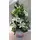 Arrangement in glass vase with white flowers