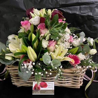 Big basket with spring flowers and flavor