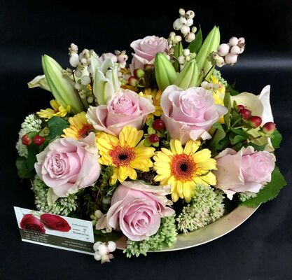 Modern arrangement on metal tray.