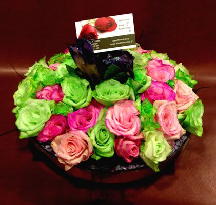 Arrangement in glass vase with white flowers & colored decorative sand!!!