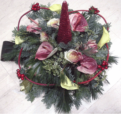 Christmas arrangement with nobilis  greens and flowers