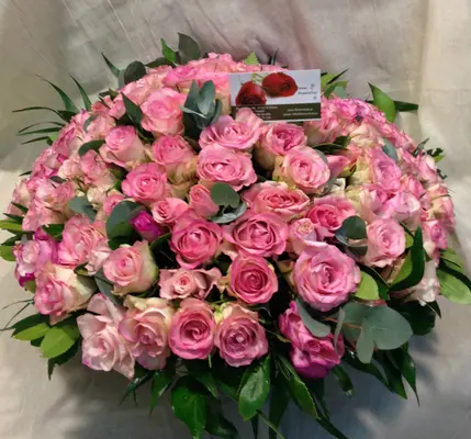 Pink Roses (100) stems round basket arrangement