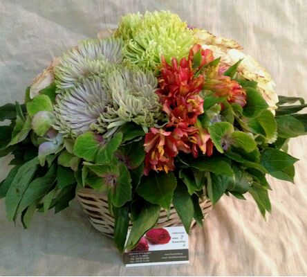 Multi colored flowers in basket