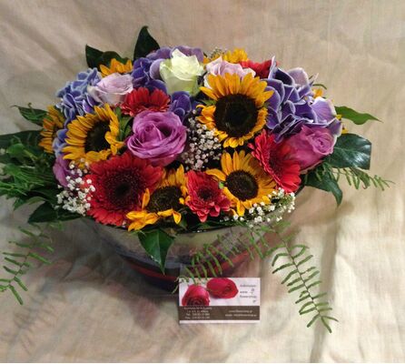 Flower arrangement "Multi Color Parade". Glass or Basket.