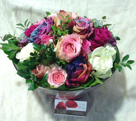 Mixed colored & "rainbow" roses in quality glass.