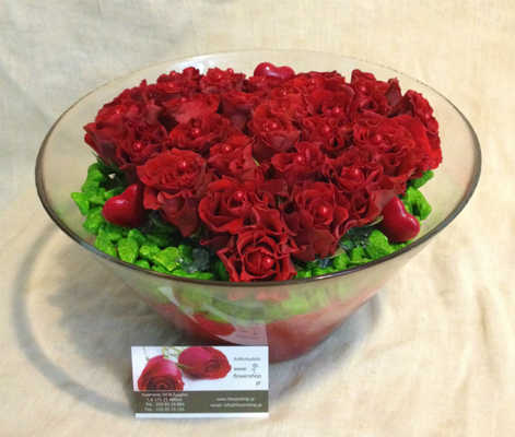 Κόκκινα τριαντάφυλλα Α' ποιοτ.Ολλανδικά σε ποιοτικό γυάλινο βάζο.