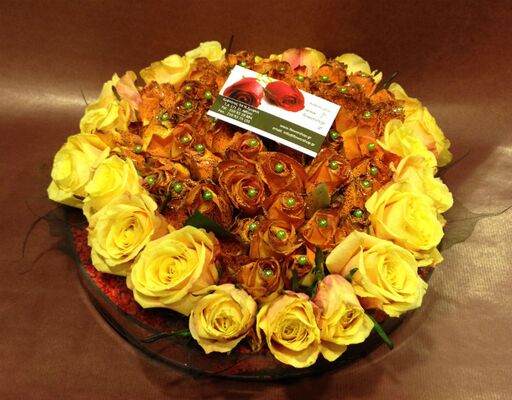 Arrangement in glass vase with white flowers & colored decorative sand!!!