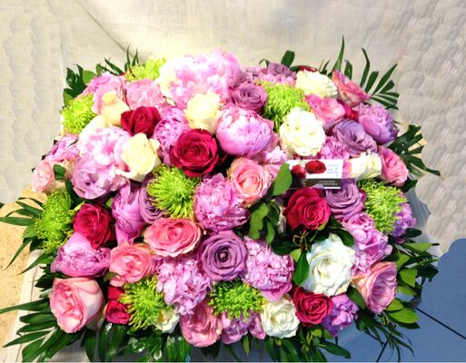 Exclusive Arrangement in Basket. (+50) Ecuador roses & Season Quality Flowers.