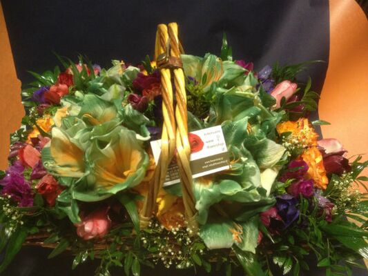 Spring colored flowers in basket.