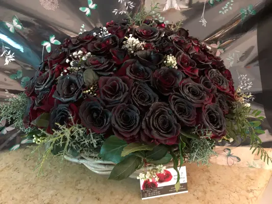 Roses Natural Black Baccara (70) stems. Very Exclusive. Quality Basket Arrangement.