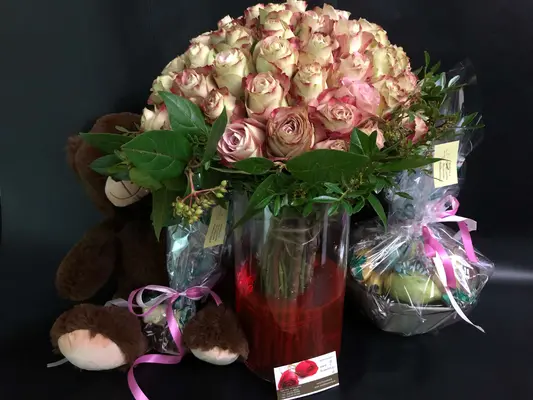 Exclusive Roses Bouquet (50+) stems. in cylinder vase with colored water. New !!! Pastel & Silver Colors. Pack with Teddy, Chocolates & Fruits.