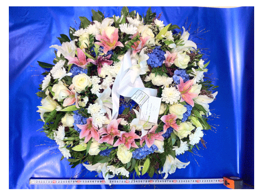 Funeral wreath on "oasis moss base"