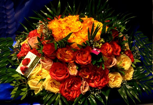 (50) orange - salmon  roses A' quality Dutch with greens in basket.