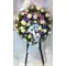 Funeral wreath on "oasis moss standing  base" with exclusive flowers.