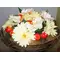 Artificial flower arrangement in vintage iron + glass pot