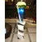 Baptismal ceremony. Flowers on vase with colored water.