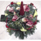 Christmas arrangement with nobilis  greens and flowers