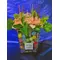 Flower salad from Colored cubes  "Oasis Moss" in glass vase with season summer flowers