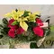 Christmas Mixed flowers & Poinsetias in  basket