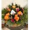 Christmas flowers in wreath basket