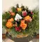 Christmas flowers in wreath basket