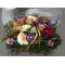 Multi colored flowers in basket