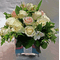Arrangement in glass vase with romantic Roses