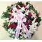 White & red condolences wreath.
