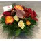 Ανθοπωλείο flowershop.gr Χειμώνας με κόκκινα & πορτοκαλί λουλούδια σε καλάθι.