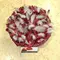 Red roses in glass with assorted Easter decoration