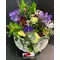 Spring joyful flowers in basket.