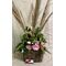 Exclusive Flower Arrangement in basket with season flowers and pampas grass.